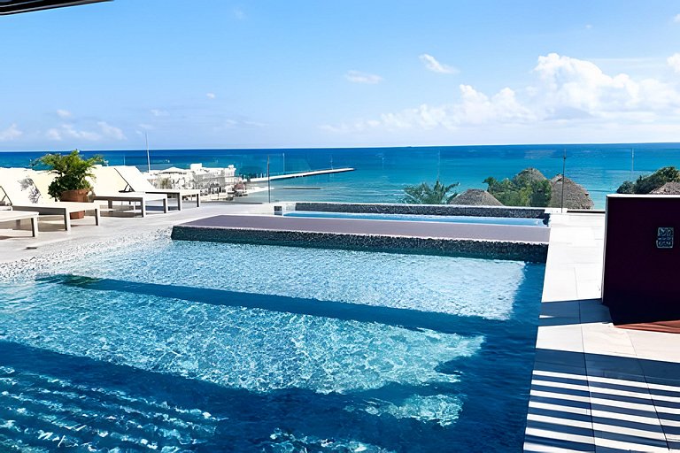 1 Block to Ocean Infinity Pool Views Modern 2BR